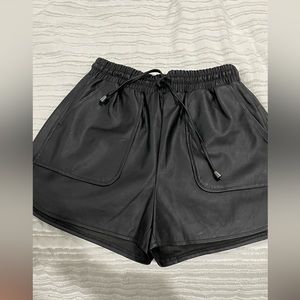 Black leather shorts
